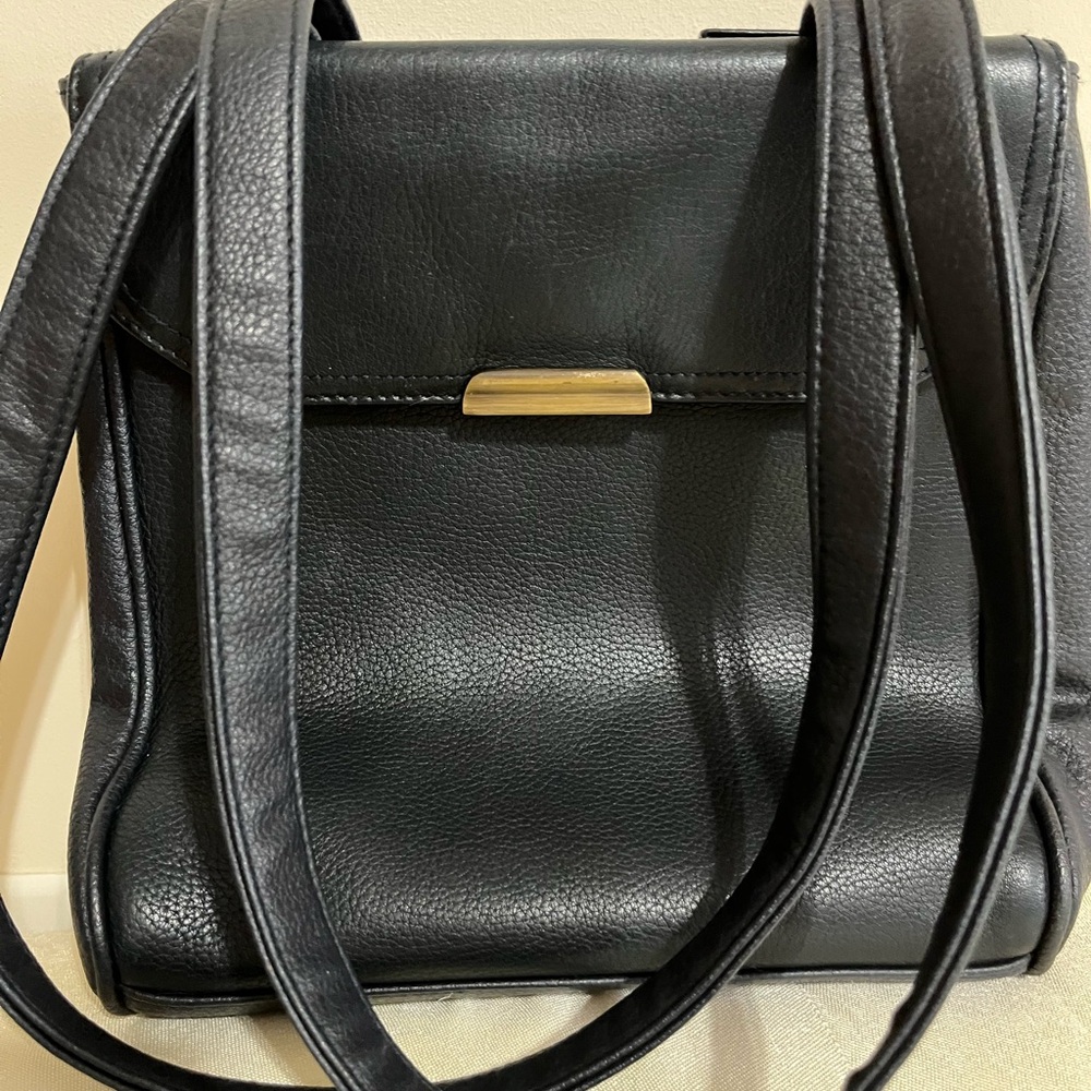 Sleek Black Leather Shoulder Bag with Gold Accents